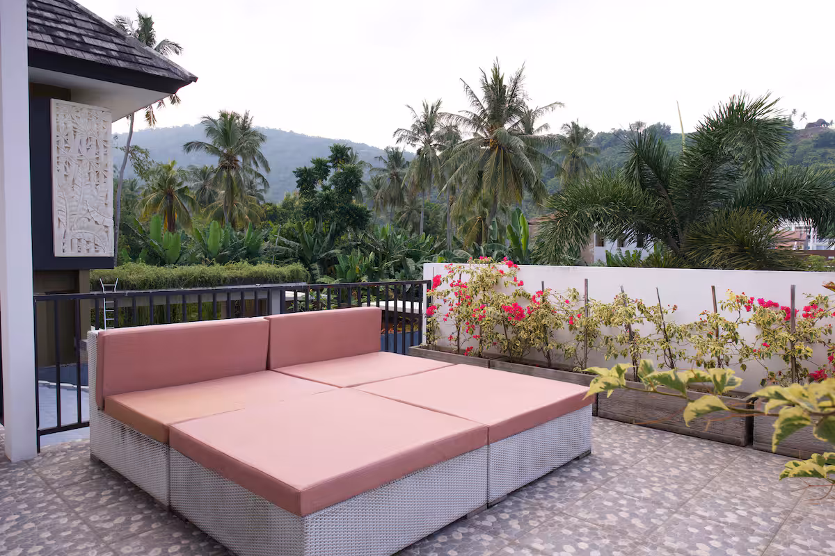 Outdoor terrace with tropical hillside view