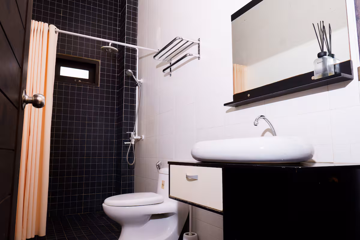 Bathroom with shower and vanity