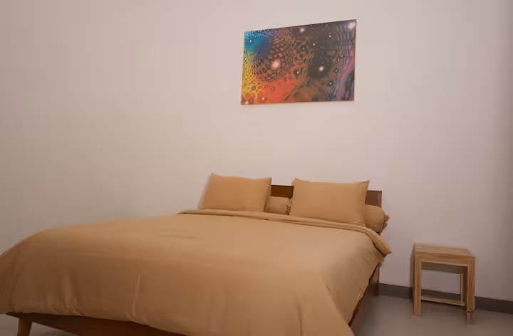 Bedroom with neutral bed linen