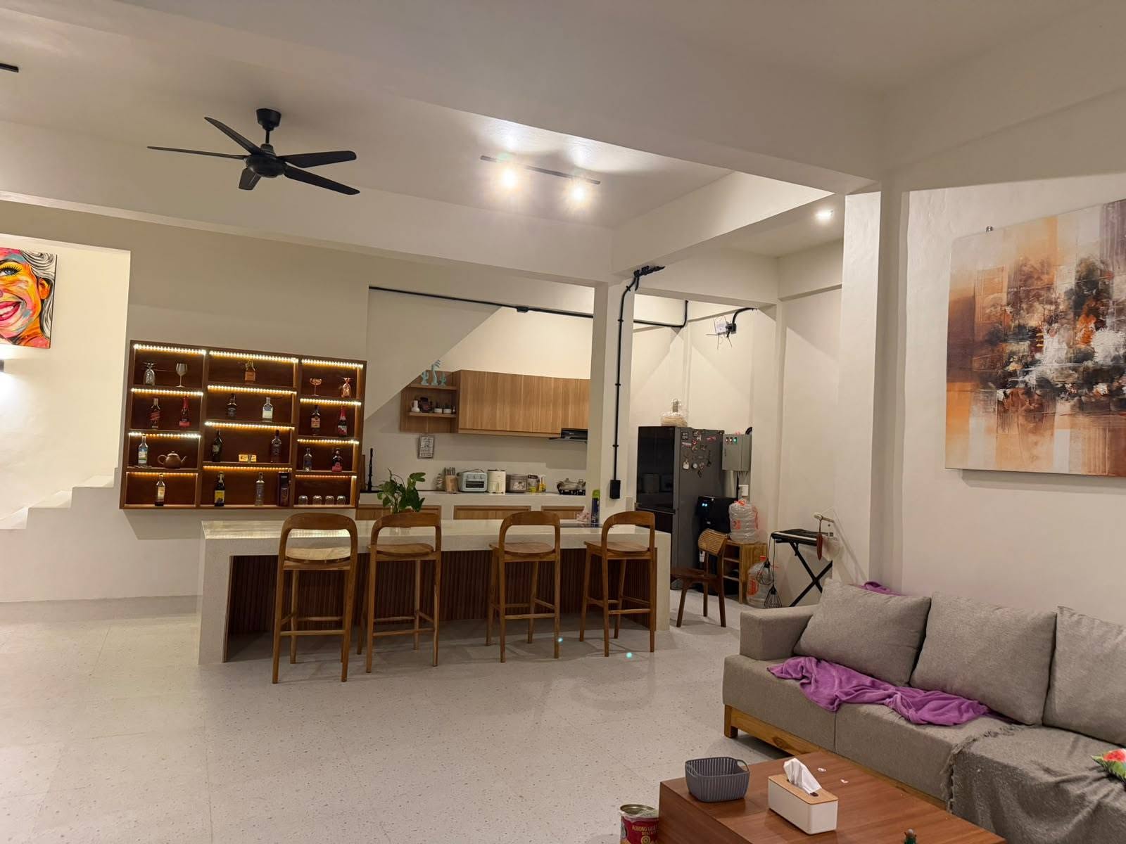 Spacious living area with kitchen and breakfast bar in Central Kuta villa