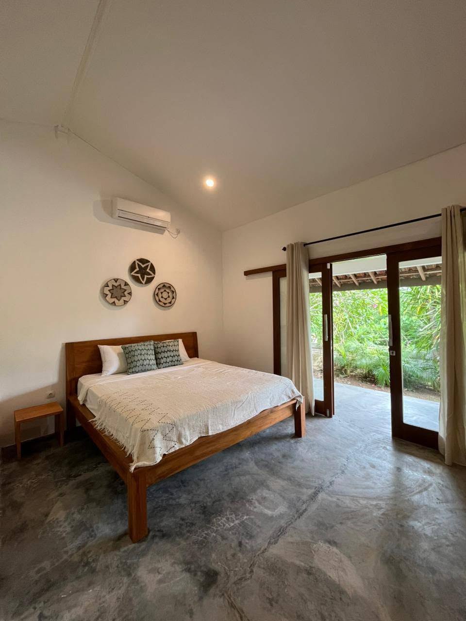 Air-conditioned bedroom with garden doors