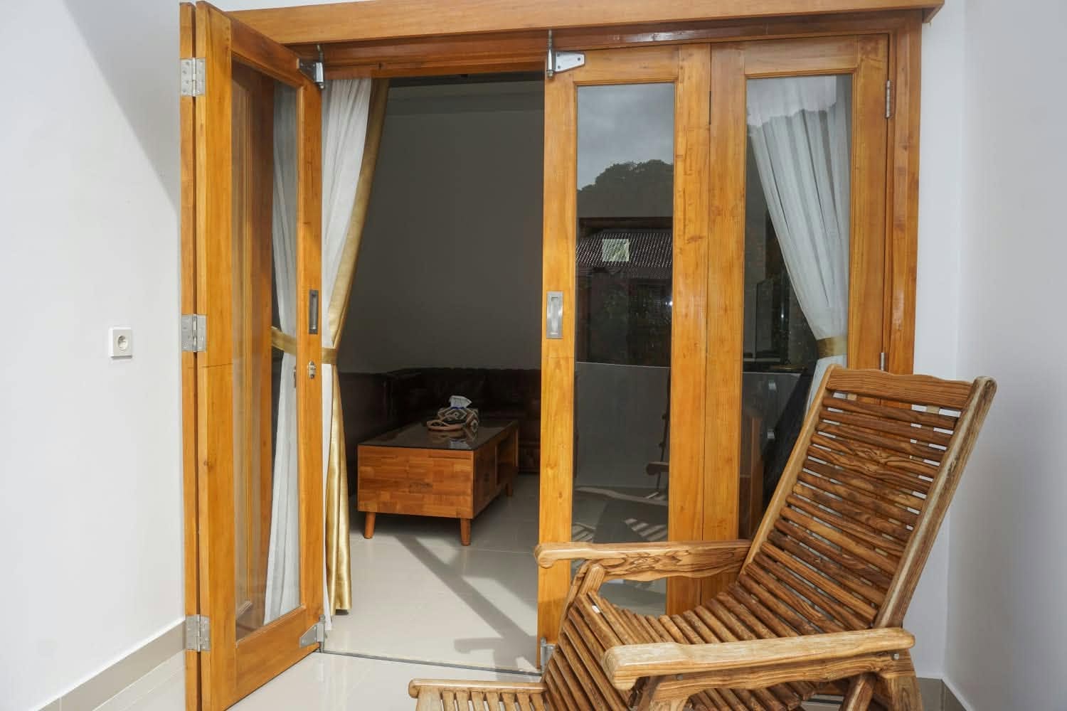 Covered terrace and bedroom entrance