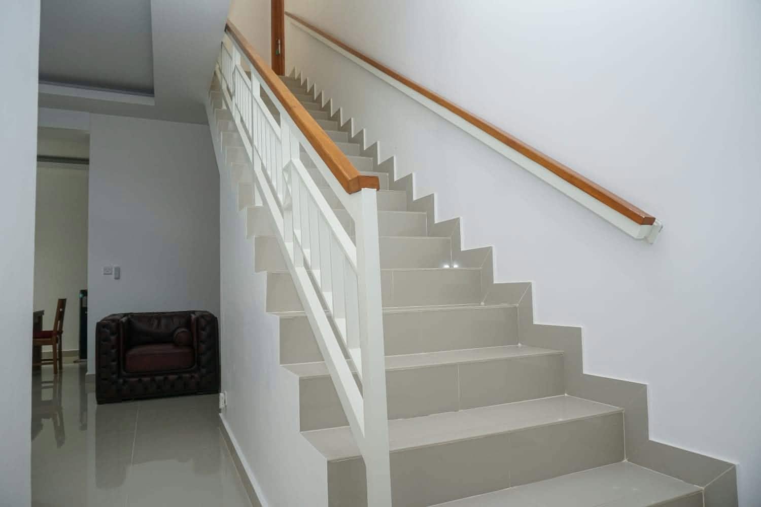 White tiled indoor staircase
