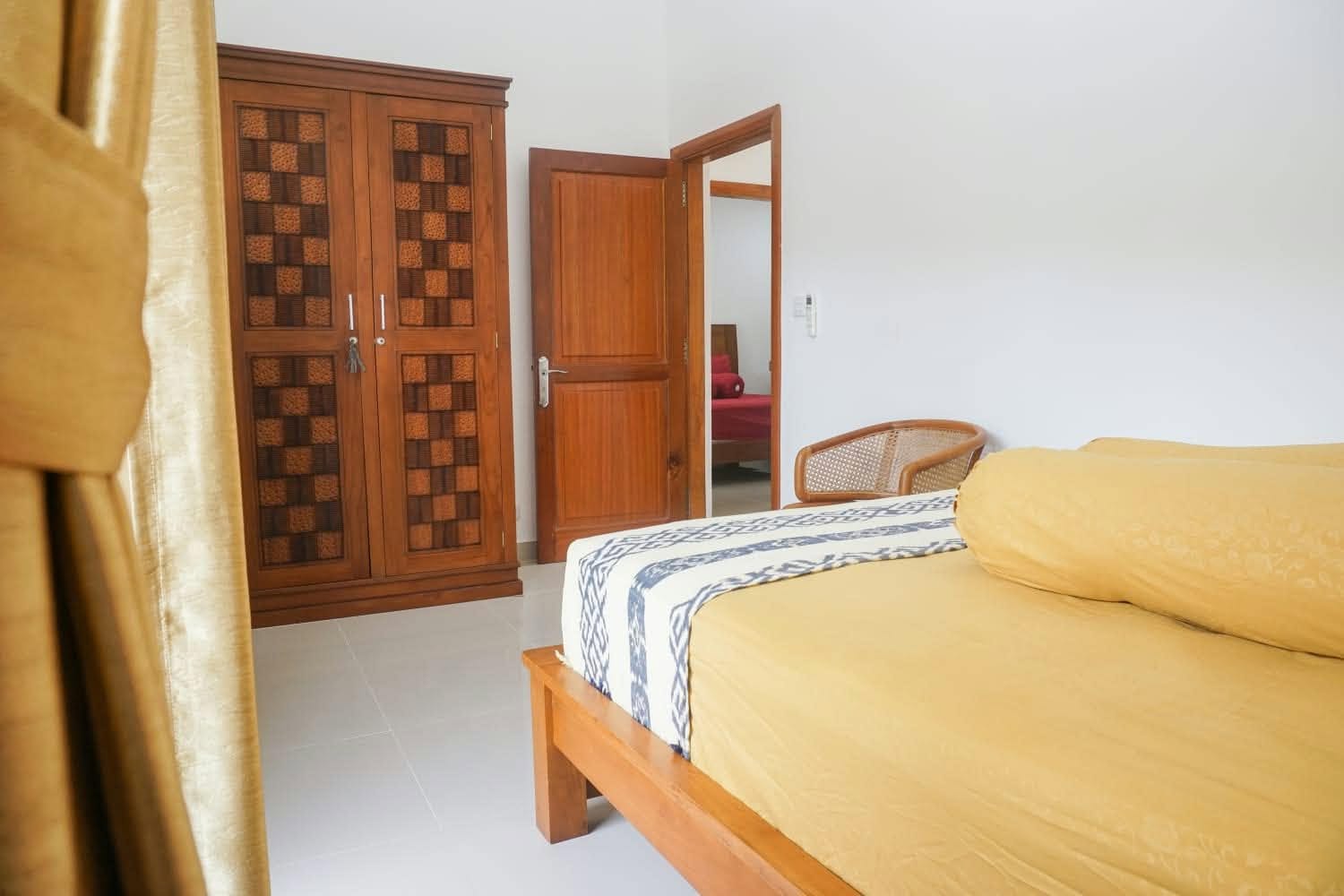 Bedroom with carved wooden wardrobe