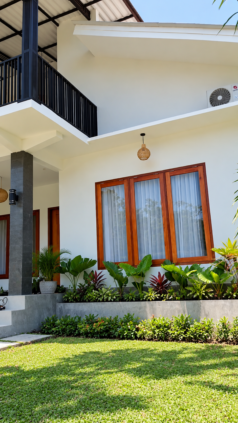 Side exterior and upper terrace of the Lombok home
